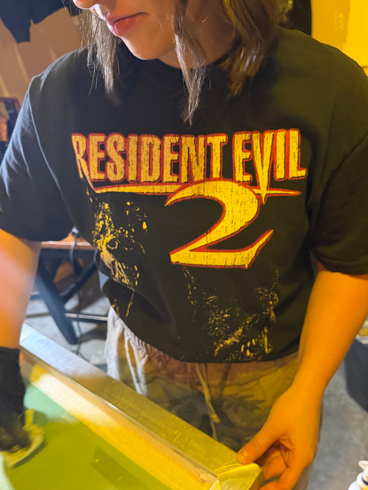 EPC oversized screen prints on stacks of vintage-wash tees